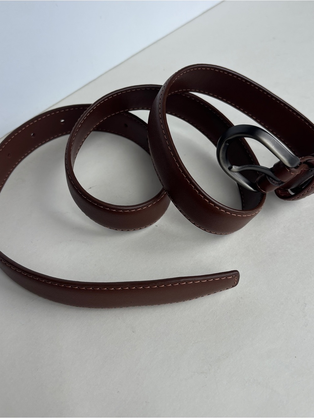 Brown leather belt with gunmetal grey buckle